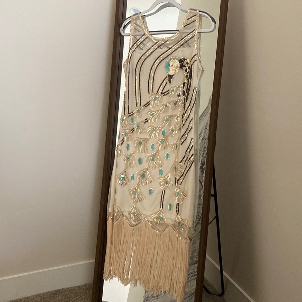 20's Flapper/Gatsby style dress. Cream color with peacock.